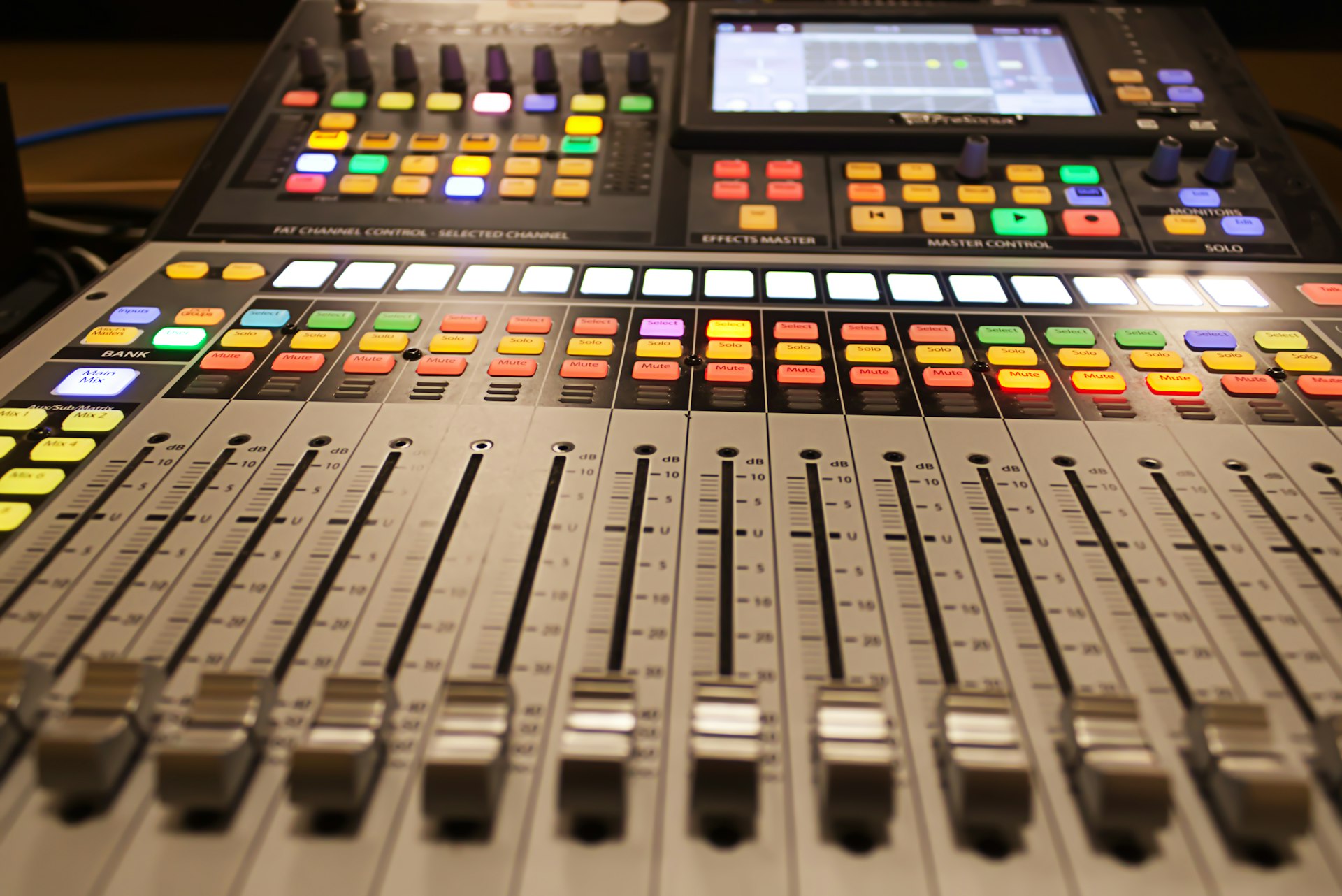 A sound board with many different colored buttons